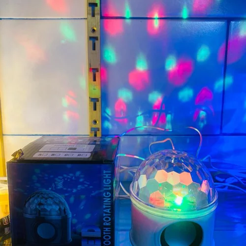 چراغ رقص نور دیسکویی گردان اسپیکر دار بلوتوثی